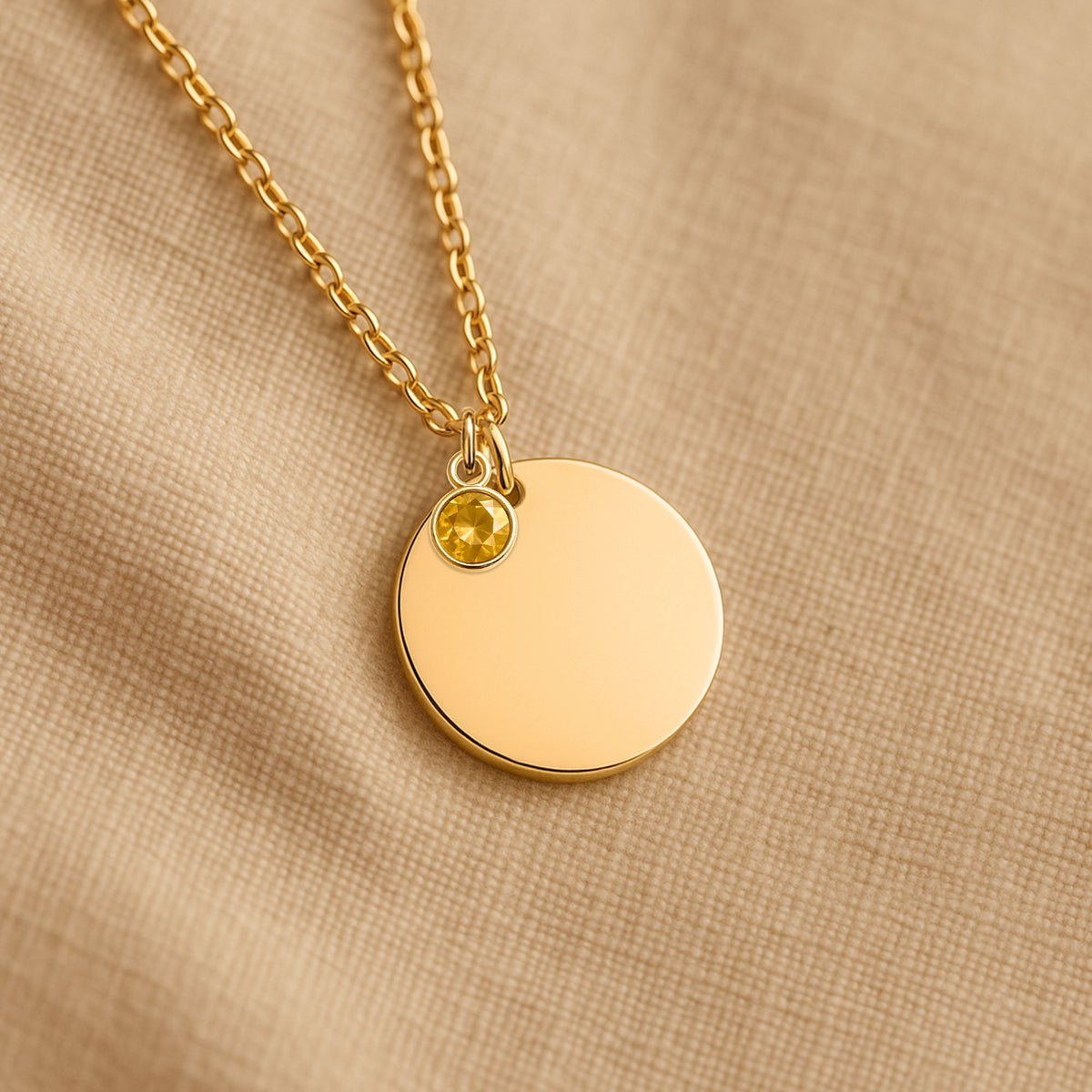Collier médaille et pierre de naissance