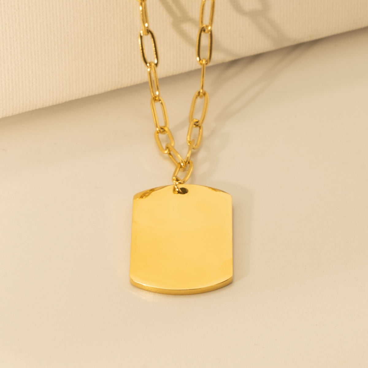 Collier trombone plaque