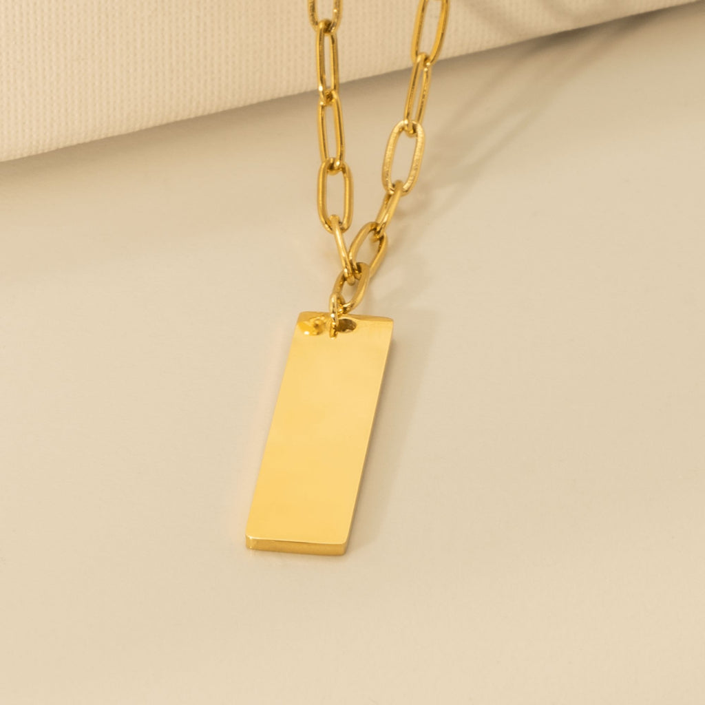 Collier trombone barre verticale